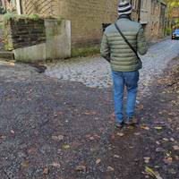 Take the first right, the cobbled Greenbooth Road. Watch out for vehicles as there are no pavements.