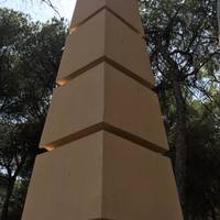 When you reach these two obelisks cross into the pine forest.