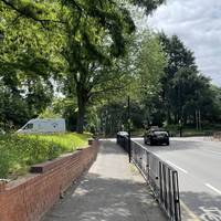 Jump off the bus and head towards the pedestrian lights on Washwood Heath Road.