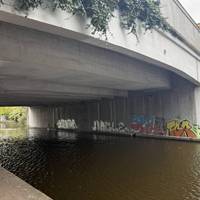 Down the ramp you’ll see the bridge from below. We’re heading under the bridge and further away from London.