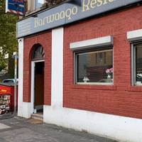 Barwaaqo Restaurant, is a Somali owned restaurant & a hive of activity behind the facade of a heritage building.