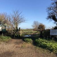 Car parking is free at the end of East End Road. At the end of the car park, head through this gate.