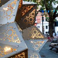 IN BLOOM is a geometric sculpture and light installation inspired by the complex forms of the stellated polyhedra.