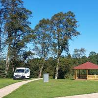 Head down to the left at the side of the cafe, past the wooden pavilion and towards the outdoor classroom area. Sit and relax for a bit!