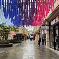 Turn left to continue walking along the pedestrianised shopping area. We loved the bunting! So uplifting.