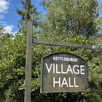 You’ll pass Kettleburgh Village Hall to your right.