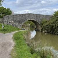 Go under Beavans Bridge.  Built in 2000 by Wilts and Berks canal volunteers.  It’s the first stone arch bridge built in living memory.