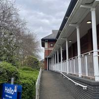 Follow the footpath with Tesco on your right.