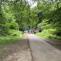 Head downhill and you'll come to the larger car park and a toilet block and information boards.