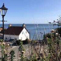 Start at the pay and display car park - head down the steps and turn right towards the beach