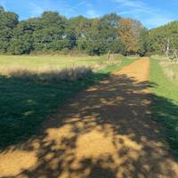 Continue to the right and the path will take you through a small playground.