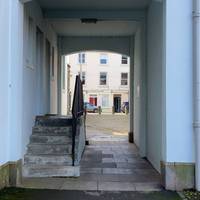 Go through this archway to the left of church street towards Sidegate