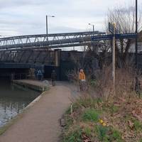 Take a right turn onto the Lee towpath and walk under the bridge you just trip-trapped over.