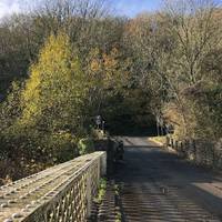 Walk back on yourself and across the bridge on the left hand side. Look out for cars and pedestrians, it’s a pretty tight squeeze.