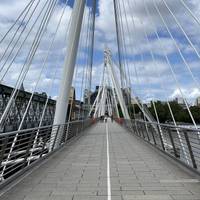 The Golden Jubilee pedestrian bridges opened in 2002. Look out at the lovely view of the Thames as you cross over.