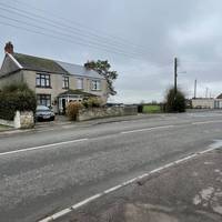 Just before North Road bends to the right, cross the road towards the last house on the opposite side.