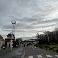 For our next landmark, head along the footpath past the cafe and towards the bridge over the road and Coalville Town Centre.