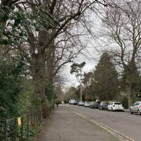 With your back to the Royal Pavilion Café turn left to walk along the pavement of the road