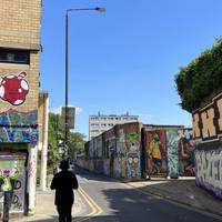 Turn right down Buxton Street which is a hub of local street art. Keep left to stay on the pavement.