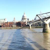 Hey fools, say hello to St. Paul's. Over the river spans a swanky footbridge, once a bit wobbly, now it stands solidly. 