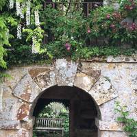 Over two bridges and you'll come across this arch.