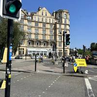 Cross the street here and walk past Parade Gardens on your right, towards the weir