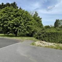 Emerge onto Station Mead, the site of the old Chilcompton Station. Cross the road onto the grass on the opposite side.