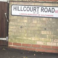 At the end of Goodrich Road, turn right onto Hillcourt Road and continue uphill on Donkey Alley.