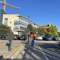 Cross the car park with care.