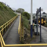 Up the slope and take a left at the top through the car park to join the costal walk