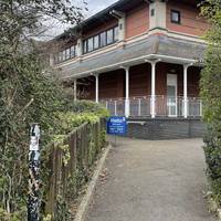 Turn right onto the small footpath that runs alongside the Tesco supermarket.