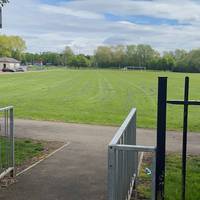 Enter the park and turn left along the path following it round towards the playground.