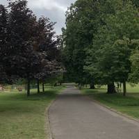 With your back to Gore Court House, turn left to walk along the avenue of trees on the flat, tarmac path. There’s a playground on the left.
