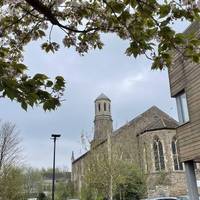 After a row of housing you'll meet St Luke's Church, a Grade II listed building.