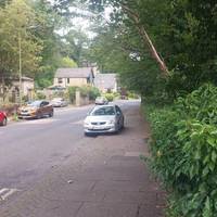 Once at the top, turn right onto the pavement of Mottram Road and follow it slightly downhill through the village.