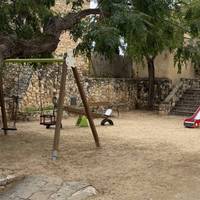 There’s a picturesque little playground for little ones.