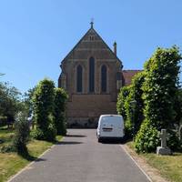 Turn left towards St Mary's Church. Behind the church, take the path through the fields on
your right.