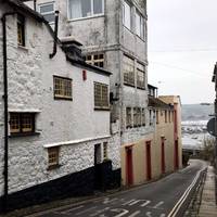 The Admiral Benbow pub (dog friendly) is said to be named after the inn in Treasure Island by Robert Louis Stephenson. 
