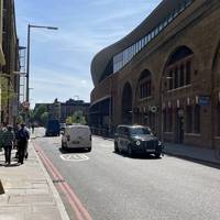 Head east along Tooley Street until you come to Hay's Galleria. To your right you will see Stainer Street tunnel leading into the station.