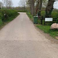 Take the path to the left and walk towards Newhall Park Farm.