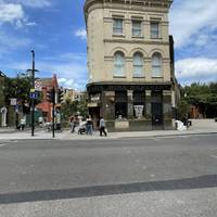 You'll soon reach a pedestrian crossing. Use this to cross Dalston Lane and turn right on the opposite side towards the mural.