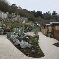 At the bottom of the hill, after passing a car park on your right, walk past the Carbis Bay Hotel and look out for the coastal path ahead.