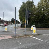 Cross Bridge Green using the push button crossings to continue  along Strelley Road. There are drop kerbs here if you need.