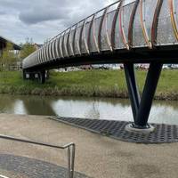 Start on the canal outside Hall and Woodhouse.  There are both steps and a ramp down to the water.