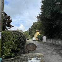 There is free on street parking along Dod Lane. Turn right into the private driveway, signposted as a public footpath.