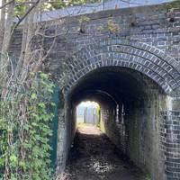 Keep following the path, head under the railway bridge and continue straight.