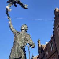 You’ll see the Muir statue and the inscription: “Around my native town of Dunbar, I loved to wander along the seashore to gaze and wonder…”