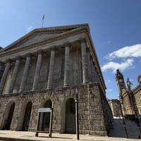 Carefully cross the road to the Town Hall, you won’t miss this Grade I listed building styled on a Roman temple.