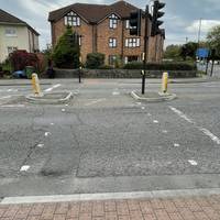From the bus stop, head to the lights to cross Wells Road. Turn right on the opposite side for few steps...