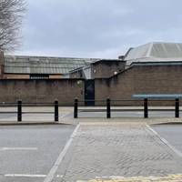 Carefully cross the road.